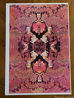 Full view of vintage 1970s Peter Max pop art poster showing the psychedelic marbled background with symmetrical mirrored photographs.