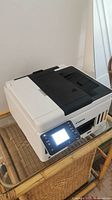 Front view of Canon Maxify GC620 printer showing touchscreen display with the device powered on.