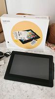 Boxed Wacom Cintiq with tablet removed, front view