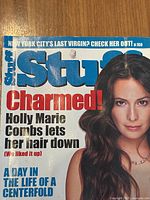 Cover of Stuff magazine with Holly Marie Combs clothed, with headlines about her and other features