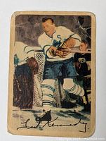 Front of 1953-54 Parkhurst Teeder Kennedy card showing player in action