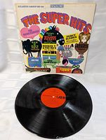 Front sleeve artwork and vinyl disc displayed