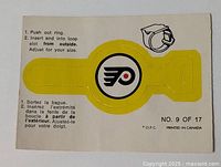 Front of O-Pee-Chee Flyers punch-out ring insert showing logo and instructions