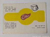 Full view of die-cut Detroit Red Wings ring insert card