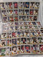 Multiple rows of 1987-88 OPC hockey cards displayed in sheets
