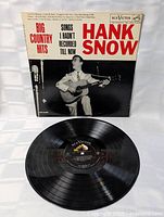 Front sleeve and vinyl record displayed