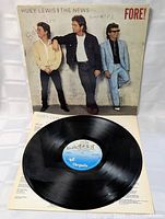 Front and inner view of sleeve with vinyl displayed