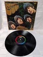 Front of jacket and vinyl record showing label