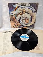 Front gatefold cover with LP and inner sleeve visible