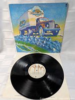 Front cover with record partially out of sleeve