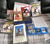 Limited edition Spider-Man collector's set with DVDs, comic replicas, collectible card, booklet, and certificate.