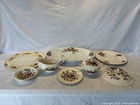 Image shows full lot with covered dish lid, covered sauce bowl, gravy boat, fruit/dessert bowls, bread & butter plate, Grindley dinner plate, Czech serving tray, and H&K cake plate arranged on white surface.