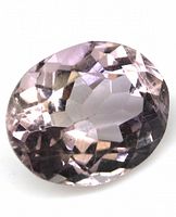 Close-up top view of the oval pink amethyst gemstone showing its faceted cut and light pink coloration.