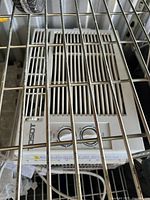 Top view of the Tosot window air conditioner showing air vents and control panel with two knobs.