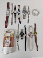 Overview photo showing 13 watches with diverse styles and character-themed designs.