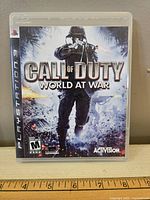 Photo of Call of Duty: World at War game for PlayStation 3 in original case showing front cover artwork.