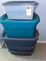 Five stacked storage bins: small light gray on top, teal in middle, three dark gray bins on bottom two images