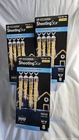 Three unopened boxes of Gemmy Shooting Star LED icicle Christmas lights with packaging showing multiple icicle strands.