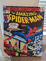 Front view of Spider-Man comic book cover canvas, featuring Spider-Man and the Green Goblin with colorful comic book style art and text.