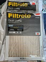 Six sealed 3M Filtrete Basic Dust Clean Living air filters in original packaging, filter size 16x20x1, filtration level 300.