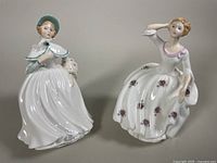 Pair of Royal Doulton porcelain figurines Jessica (left) and Maureen (right) side by side