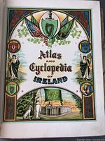 Decorative illustrated title page showing flags, coat of arms, and ornate borders with the title 'Atlas and Cyclopedia of Ireland'