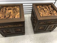 Both end tables side by side showing overall design and matching carvings
