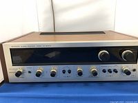 Front view showing full control panel and tuning display