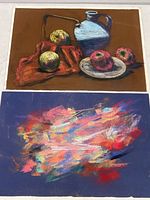 Photo showing two pastel paintings: one still life with fruit and jug, and one abstract colorful piece.