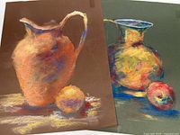 Photo of two pastel paintings side by side showing pottery vessels and fruit in warm colors.