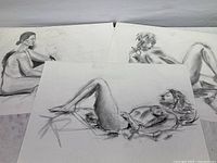 Three original pastel nude study drawings of females on paper, all laid out flat on a table, showing full view of each artwork.