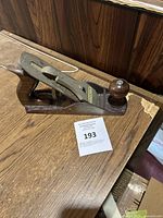 Front side photo showing the Stanley branded hand plane on a wooden surface