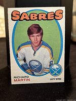 Front of 1971-72 OPC Hockey Card #161 featuring Richard Martin in Sabres uniform, showing team name, player photo, and position.