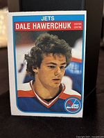 Front view of 1982-83 O-Pee-Chee Dale Hawerchuk rookie card showing player's image and team branding.