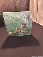 Front of the original sealed box of the 1996 Canadian Sterling Silver 50 Cents Little Wild Ones 4 Coin Nature Set showing images of wildlife and packaging details.