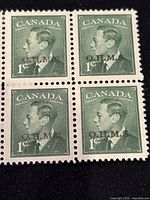 Block of four mint condition Canada 1 cent stamps depicting King George VI with O.H.M.S. wartime overprint.