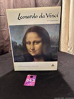 Front cover of the hardcover book displaying the title 'Leonardo da Vinci' with the Mona Lisa painting image.