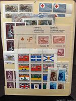 Full sheet and blocks of various mint Canadian stamps from 1960s and 1970s, mostly 17 cent denomination, including flags and commemorative themes.