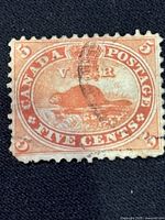 Close-up of the used 5 cent Canada Beaver stamp showing design and cancellation mark.
