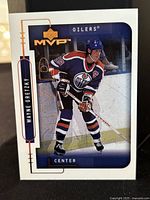 Front of the Wayne Gretzky 1999-00 Upper Deck MVP hockey trading card showing player in Oilers uniform.