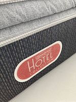 Close-up of the Beauty Rest Hotel Collection label on the mattress side.