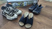 All four items together including new backpacking tent box, Jordan sneakers, Keen water shoes, Fly Flot sandals