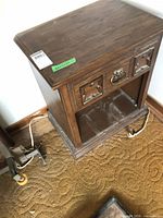 Front and right side view of the Kroehler wooden night table with drawer and open shelf below, showing wear on surface and drawer.