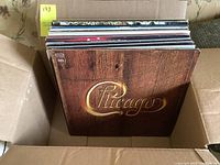 Image of box filled with vinyl records showing front cover of Chicago album