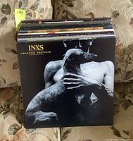 Top view of vinyl record box lot with INXS Shabooh Shoobah album cover on front