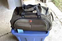 Front view of Swiss Gear duffle bag showing logo, handles, and front pockets.