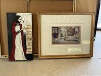 Oil painting of dog in red cloak and framed Morning Time print side by side.