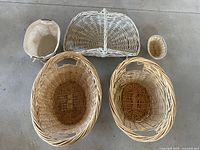 Top view of baskets arranged in a semi-circle showing weave patterns and basket shapes.