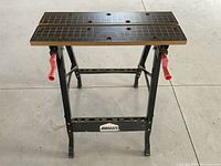 Front view showing full structure, Jobmate label on bottom support, clamp handles on sides.