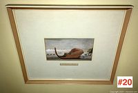 Framed 19th century print depicting a Canadian cariole sleigh with a snowy landscape and horse-drawn sleighs in the background.